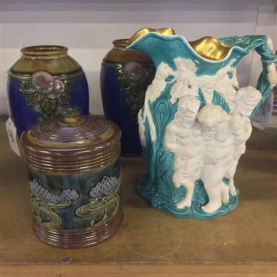 Minton stoneware Silenus jug, relief-moulded & part-glazed in green, gilt to rim interior, impressed 19 (restored)